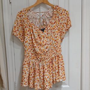Torrid White and Orange Flutter Sleeve Blouse with Ruched Peplum Size 2.